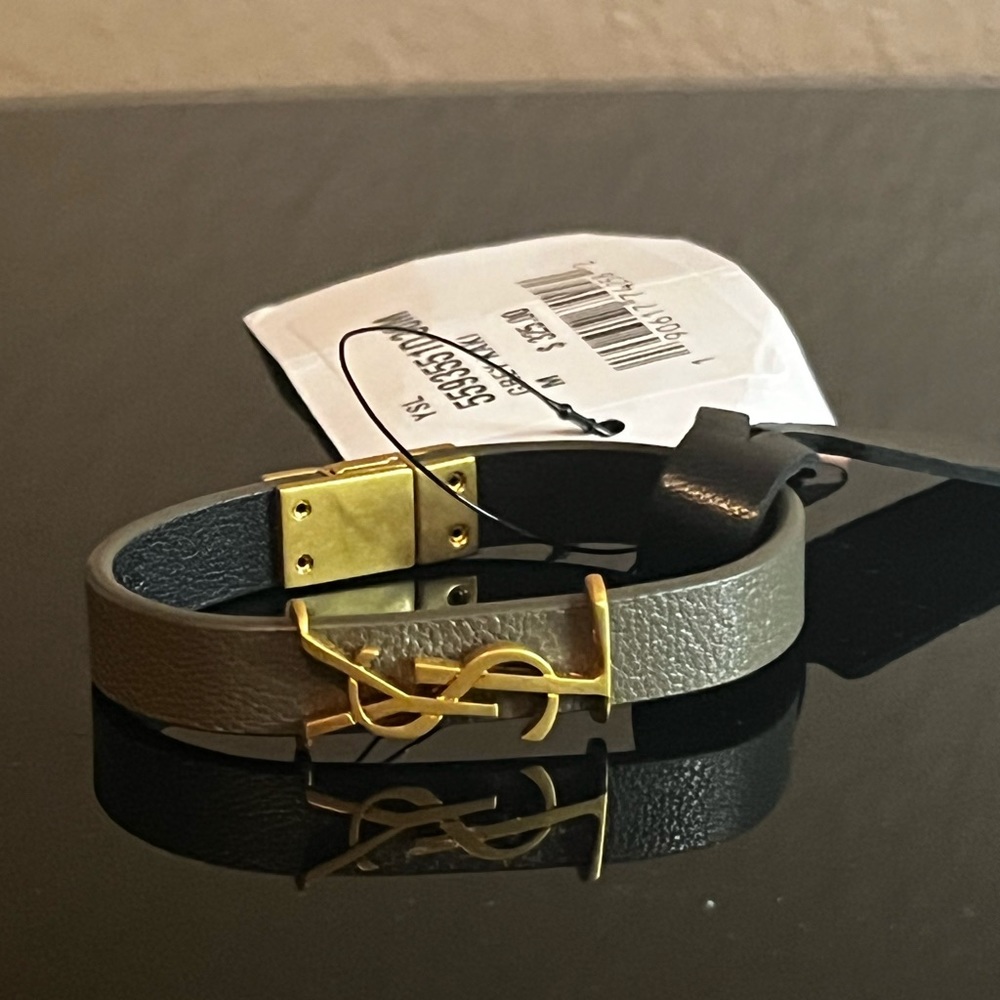 New Saint Laurent (YSL) bracelet Saks (my job). Item has never been worn